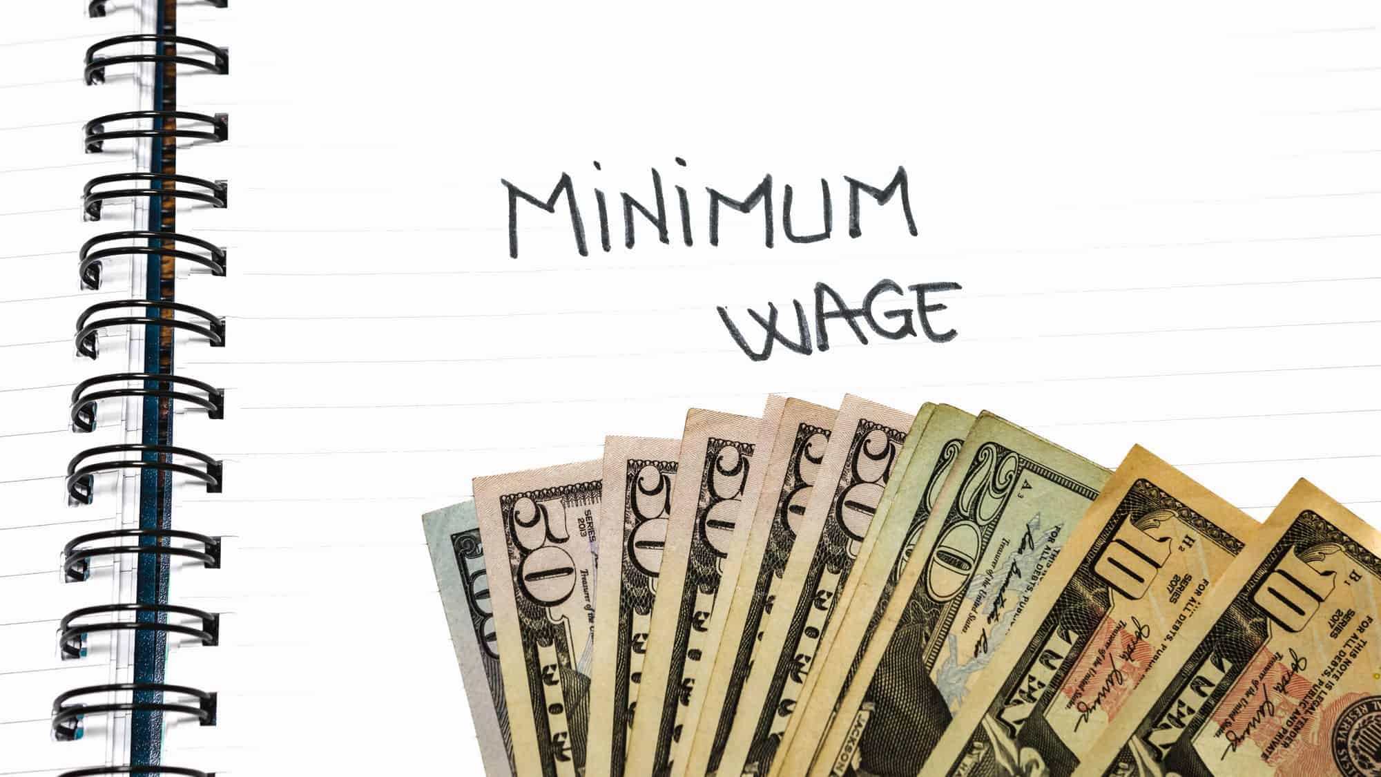 Minimum wage handwriting text on paper